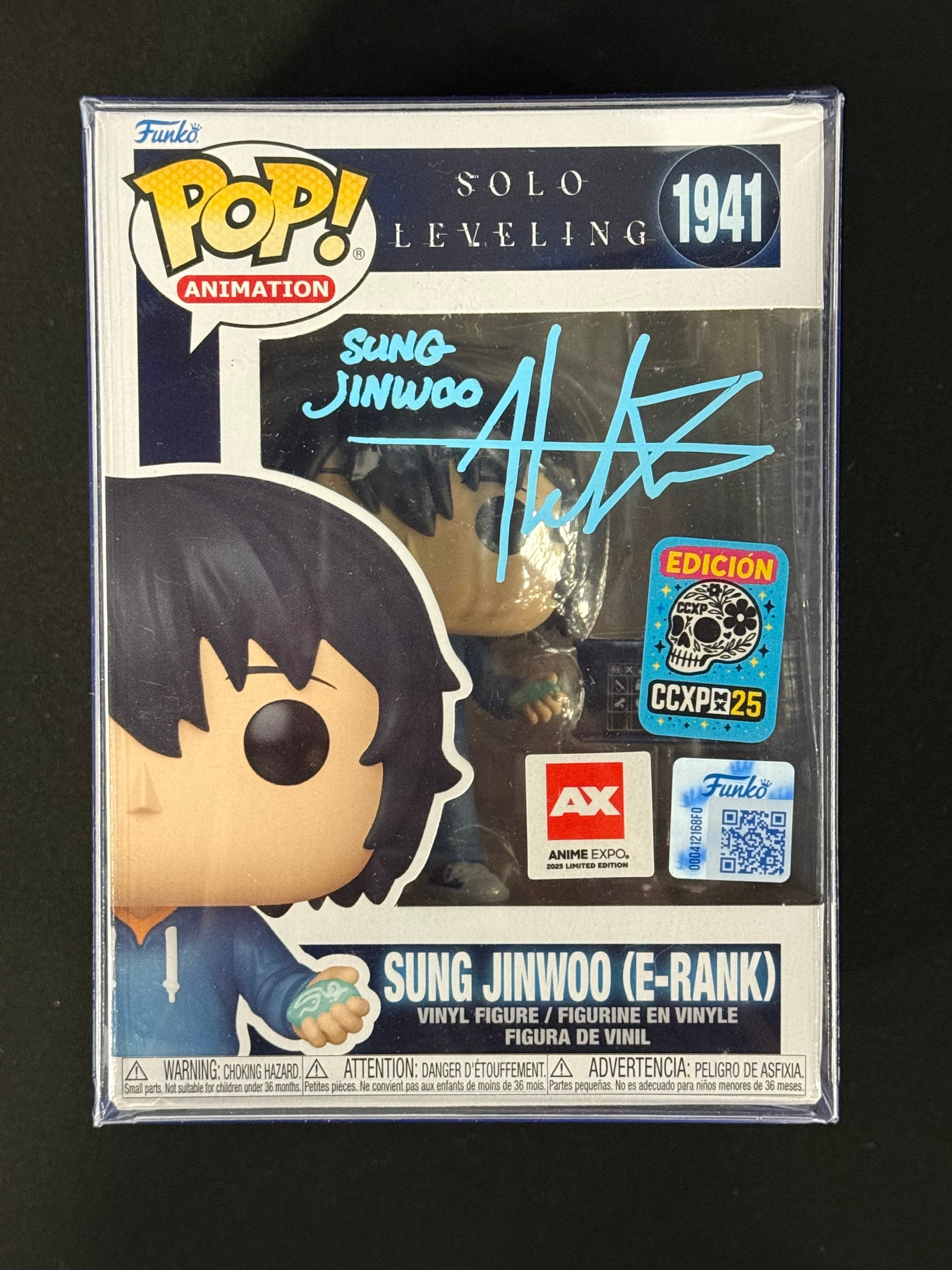 Funko Pop! vinyl figure packaging with autograph and certification stickers on a black background